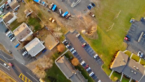 Aerial-view-of-a-typical-suburb-in-sleeping-area,-housing-development-of-family-homes-and-townhouses