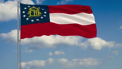 Georgia-State-flag-in-wind-against-cloudy-sky