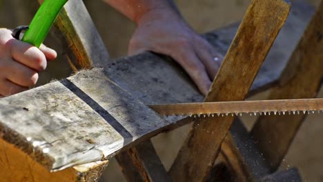 HD:-Carpenter-Sawing-the-Wood---Stock-Video-close-up