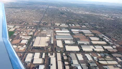 Aerial-airline-approach-Phoenix-Arizona-industrial-area-HD