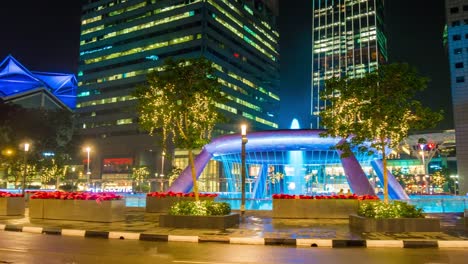 Singapur-echte-Nacht-Licht-Kreisverkehr-Suntec-Einkaufszentrum-Stadtpanorama-4k-Zeitraffer