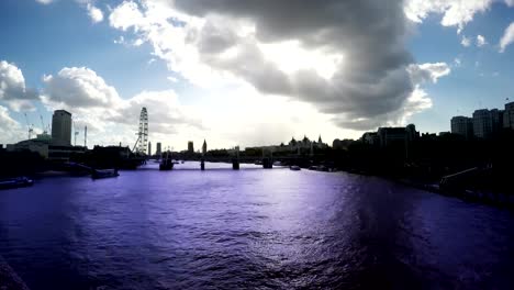 Río-Támesis,-el-Big-Ben-y-el-London-Eye,-el-tiempo-transcurrido,-Londres,-lazo