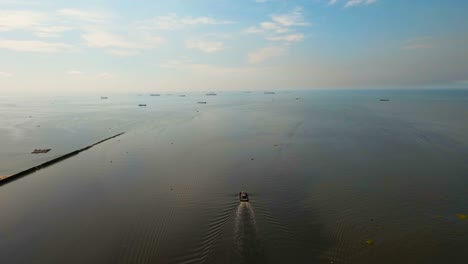 Aerial-view-tugboat-in-the-sea.Philippines,-Manila