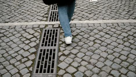 Young-pretty-woman--tourist-moving-down-the-stairs-in-the-ancient-centre-of-Rome,-Italy-to-Roman-Forum