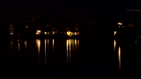 Timelapse-of-night-coming-to-waterside-village-in-Netherlands