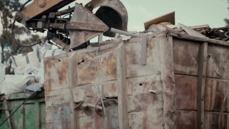 Save-the-planet.-kids-holding-signs-standing-in-a-huge-junkyard