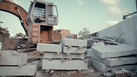 Young-kids-holding-save-the-planet-signs-standing-in-a-huge-junkyard