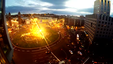 Aerial-View-of-traffic-on-Placa-Espanya-and-Montjuic-Hill-with-National-Art-Museum-of-Catalonia,-Barcelona,-Spain