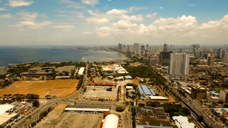 Aerial-city-with-skyscrapers-and-buildings.-Philippines,-Manila,-Makati