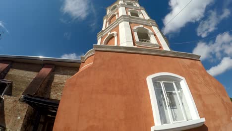 Colonial-16th-century-Spanish-built-of-Saint-Paul-the-First-Hermit-Cathedral-also-known-as-San-Pablo-Cathedral,-showing-her-bell-tower.-tracking-shot