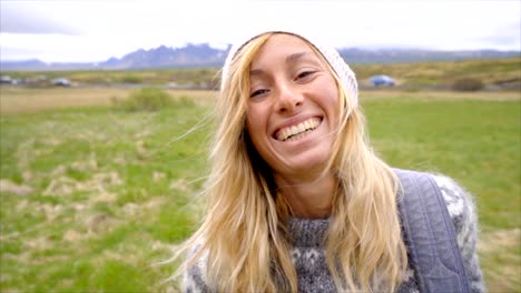 Portrait-of-blond-hair-woman-in-Iceland-SLOW-MOTION