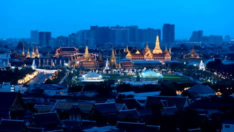 Time-lapse-day-to-night.-The-King's-Birthday-ceremony-at-Sanam-Luang.-Grand-Palace,-Temple-of-dawn-and-Wat-Pho-in-Bangkok-City-at-night,-Thailand.-4K-cityscape-vdo