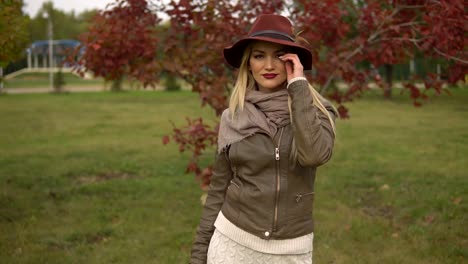 beautiful-blonde-girl-walking-in-the-park