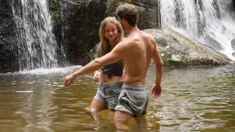 Carefree-couple-in-waterfall