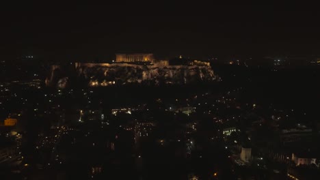 Aerial-view-of-the-parthenon-temple-on-acropolis-hill-at-night-in-Athens.