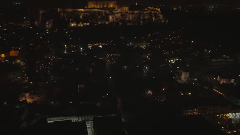 Aerial-view-of-the-parthenon-temple-on-acropolis-hill-at-night-in-Athens.