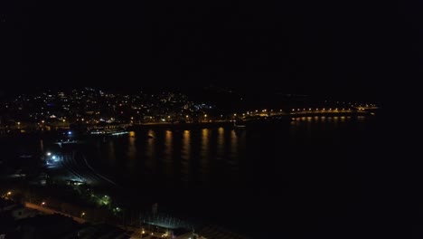 Aerial-view-of-Alithini-at-night,-Syros-island,-Greece.