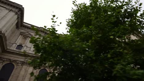 Low-angle-moving-shot-of-St.-Paul's-Cathedral-in-London,-a-church-of-England-cathedral-and-a-major-tourist-attraction.