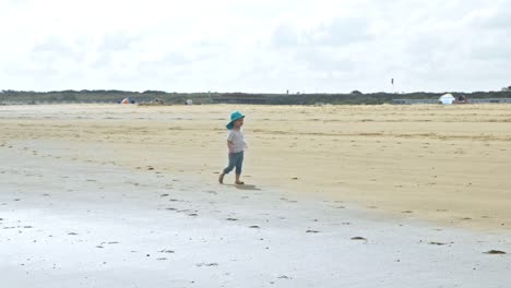 Toddler-Running-on-Beach