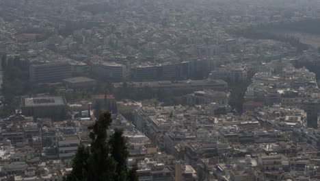 Vista-aérea-de-los-tejados-y-casas-en-Atenas,-Grecia.