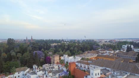 Rising-View-of-the-City-of-Seville,-Spain-in-the-Evening