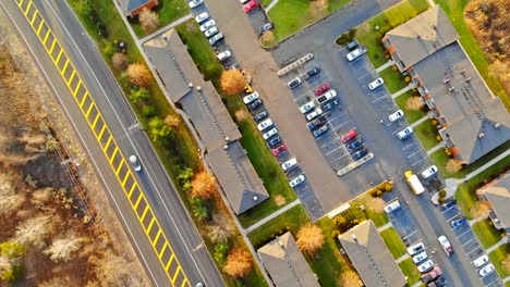 Aerial-shot-flight-over-the-sleeping-area-view-from-above-on-the-roofs-of-houses,-beautiful-gardens,-lawns,-roads-in-the-summer.