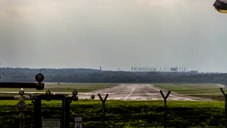 Hamburg-airport-runway-with-landing-and-starting-aircraft---timelapse