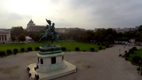 Heldenplatz-of-Hofburg-Palace-in-Vienna,-president-of-Austria.-Beautiful-aerial-shot-above-Europe,-culture-and-landscapes,-camera-pan-dolly-in-the-air.-Drone-flying-above-European-land.-Traveling-sightseeing,-tourist-views-of-Austria.