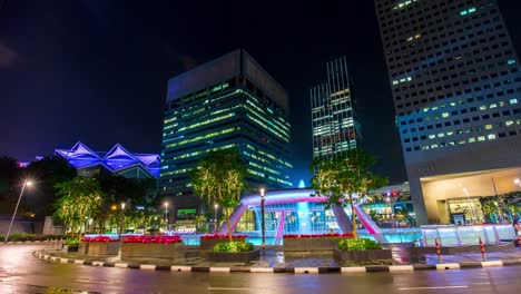 Singapur-Nacht-wenig-befahrenen-Brunnen-Kreis-Suntec-City-4k-Zeitraffer