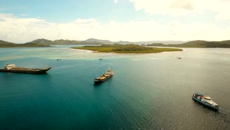 Aerial-Cargo-and-passenger-ships-in-the-sea.-Philippines,-Siargao