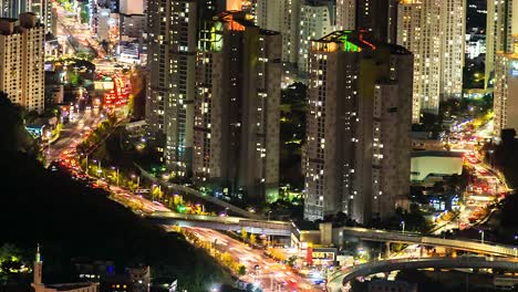 4K,-Time-lapse-view-of-Busan-city-buildings-at-night-of-South-Korea