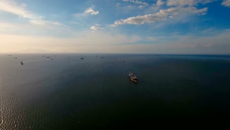 Aerial-Cargo-ships-anchored-in-the-sea.-Philippines,-Manila