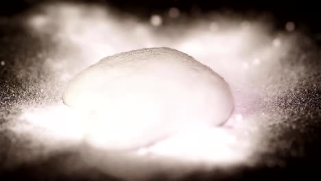 White-powder-on-top-of-the-paper.-Chemical-Reaction-Texture-Of-Bubbling-Powder.-Quenching-soda-vinegar-macro