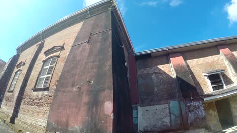 Colonial-16th-century-Spanish-built-of-Saint-Paul-the-First-Hermit-Cathedral-also-known-as-San-Pablo-Cathedral,-showing-her-east-side-nave-brick-walls.-tracking-shot