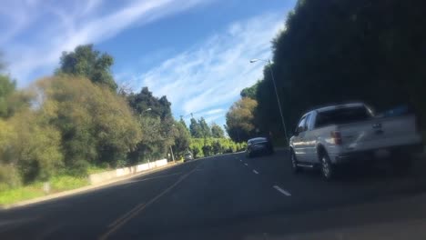 Driving-on-Sunset-Blvd.-in-Beverly-Hills,-California---DREAMY/ROMANTIC-FILTER