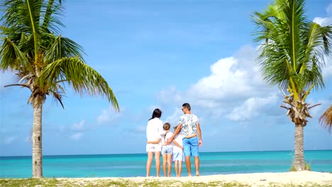 Parents-with-two-kids-enjoy-their-caribbean-vacation-on-Antigua-island
