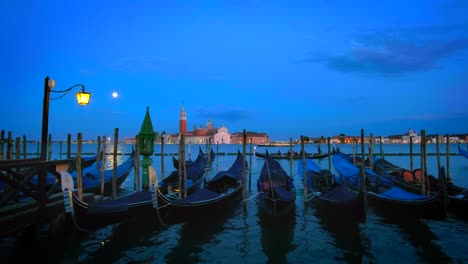 Gondolas-in-lagoon-of-Venice,-Italy