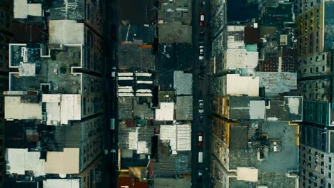 Abstract-aerial-drone-footage-of-old-rooftops-in-the-densely-populated-area-in-Hong-Kong