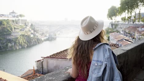 Woman-walking-on-street-above-city