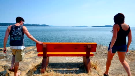 Man-and-Woman-Couple-Watch-BC-Ferry-Passenger-Boat-Sail-Past