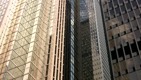 Buildings-reflect-clouds.-Timelapse.