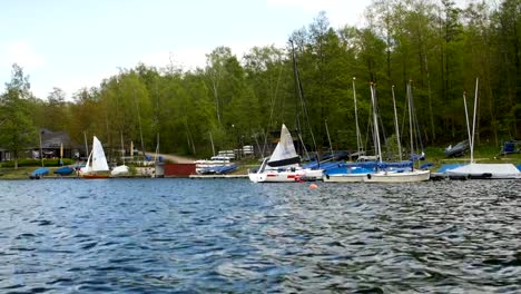 Boats-on-shore-at-lake