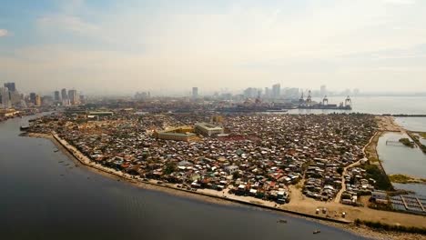 Luftbild-Stadt-mit-Wolkenkratzern-und-Gebäuden.-Philippinen,-Manila,-Makati