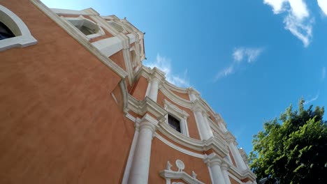 Colonial-16th-century-Spanish-built-of-Saint-Paul-the-First-Hermit-Cathedral,-showing-her-facade.-tracking-shot