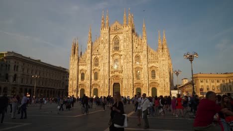 Italy-sunset-time-milan-famous-crowded-duomo-cathedral-sqaure-slow-motion-panorama-4k