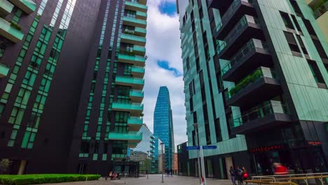 Italy-milan-city-sunny-day-famous-modern-block-walking-square-panorama-4k-timelapse