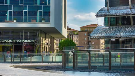 Italy-milan-city-sunny-day-famous-modern-block-fountain-square-panorama-4k-timelapse