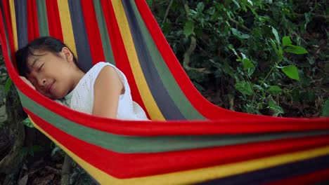 Slow-motion,-Little-girl-is-sleeping-in-hammock