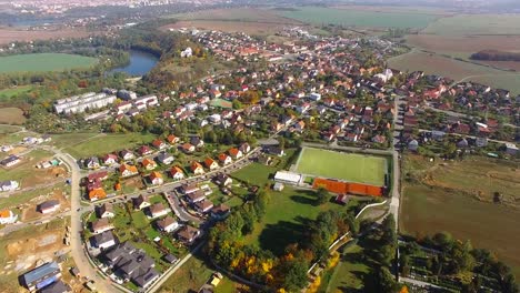 Camera-flight-over-new-family-houses-and-construction-site-in-suburban-district.-Construction-industry-and-economic-growth-in-European-Union.