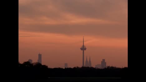 Timelapse-of-sunrise-over-cityscape-of-Cologne-Germany